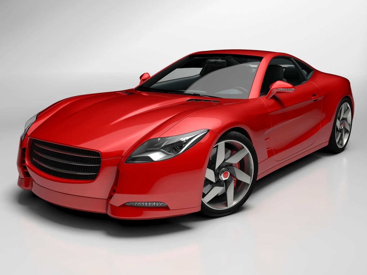 A red sports car is shown in this picture.